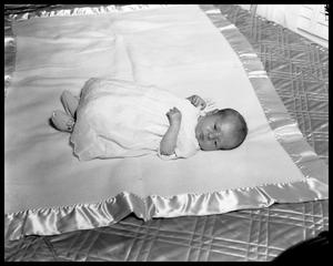 [Baby Lying on Blanket]