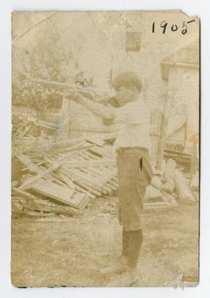 Primary view of object titled '[Photograph of Charles Bohannon King with a Gun]'.