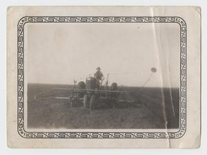 [Photograph of Jack Nelson Plowing a Field]