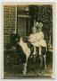 Primary view of [Photograph of Two Unknown Girls on a Pony]