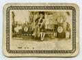 Primary view of [Photograph of a Unknown Couple at a Gas Pump]