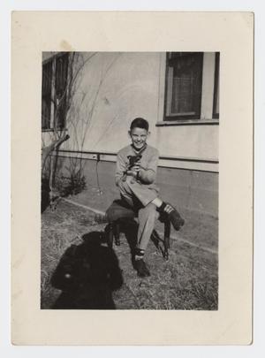[Photograph of Jimmy Arnold with his Dog]