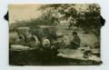 Photograph: [Photograph of an Unknown Woman on a Picnic Blanket]