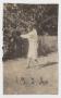 Photograph: [Photograph of Lee Turney Swinging a Golf Club]