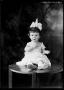 Photograph: [Portrait of Baby Girl with Bow]