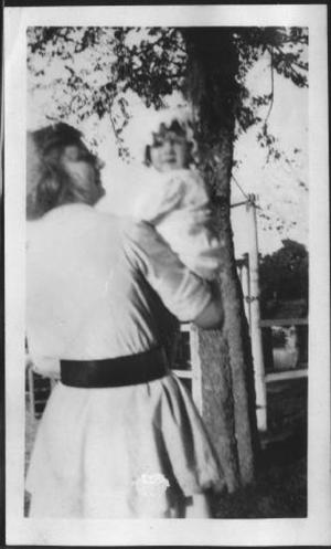 [Photograph of a woman holding the infant Mary Jones]