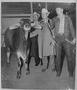 Photograph: [Photograph of a young man with a Brahman show steer]