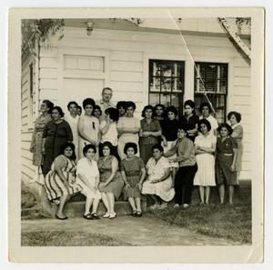 {Photograph of a Large Group of Women and One Man]