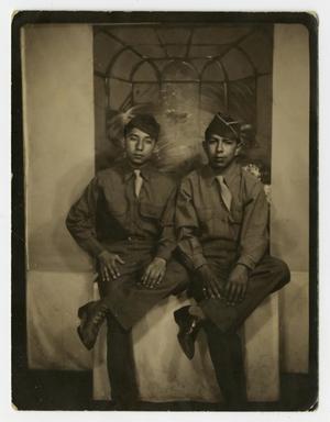 [ Photograph of Two Men Posing in Uniforms]