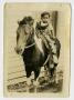 Photograph: [Photograph of a Boy on a Horse]