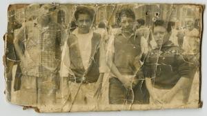 [Photograph of Four Boys Outside]