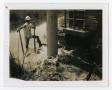 Photograph: [Man Wearing Hard Hat Standing In Water]