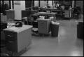 Photograph: [Man Working at Desk at Beaumont Enterprise #18]