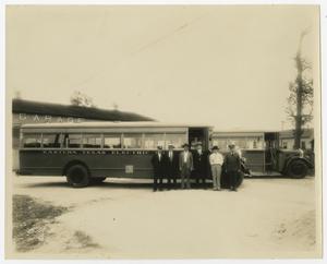 [Six Men by Bus]