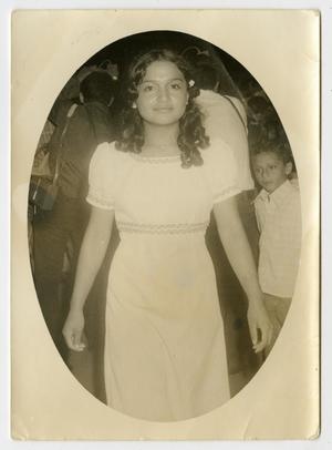 [Photograph of a Young Woman Wearing a Long Dress]