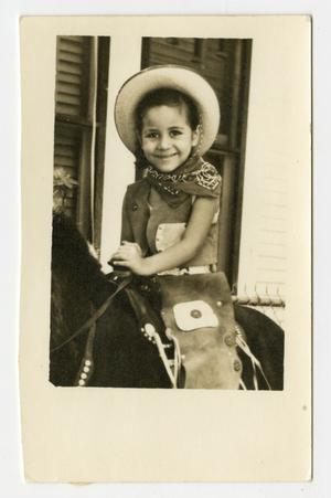 [Photograph of Young Child on a Horse]