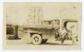 Photograph: [Two Men by Truck]