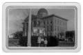 Primary view of Bee County Courthouse and World War I Cannon