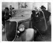 Photograph: [Clyde Barrow and Bonnie Parker's Bullet Hole-Ridden V8 Ford]