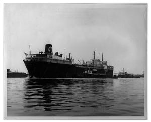 Primary view of object titled '[Tugboats Pulling Tanker to Sea]'.
