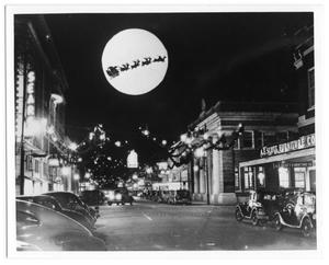 Primary view of object titled '[Christmas Decorations at Night]'.