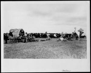 [Albert Peyton George with ranch cowboys taking a break at the chuck wagon]