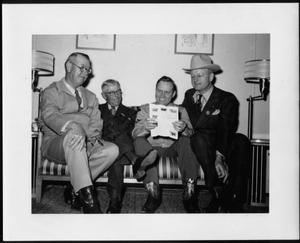 [Albert Peyton George, Gene Autry, and two unidentified men]