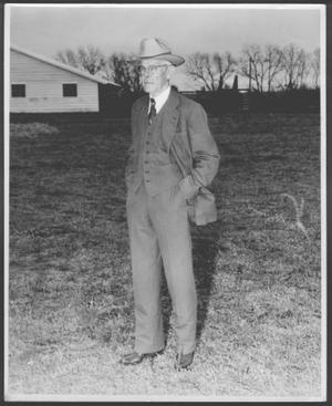 [Albert Peyton George at George Ranch standing with his hands in his pockets]