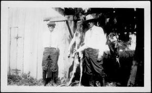 [Albert Peyton George and an unidentified man with a trussed deer and turkey]