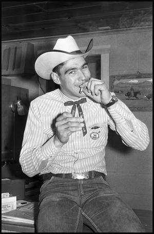 [Photograph of Benny Reynolds Smoking Cigarette]