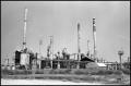 Photograph: [Side View of the Old Fina Refinery]