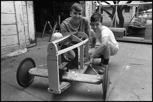 [Boys Working on a Soap Box Derby Car]