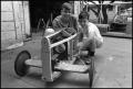 Photograph: [Boys Working on a Soap Box Derby Car]