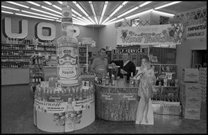 [Photograph of Mickey Huffman and Gentleman in Liquor Store]