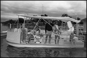 [Group on Pontoon Boat]