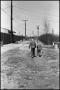 Photograph: [Two Young Boys Walking on Dirt Road]