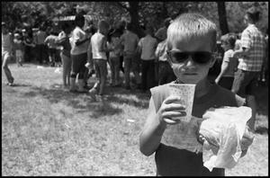 [Boy Holding Meal at Kid Fishing Rodeo]