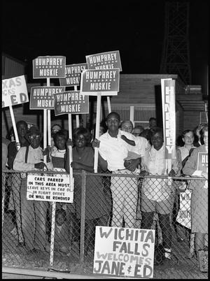 [Evening Photograph of Humphrey and Muskie Supporters With Signs]