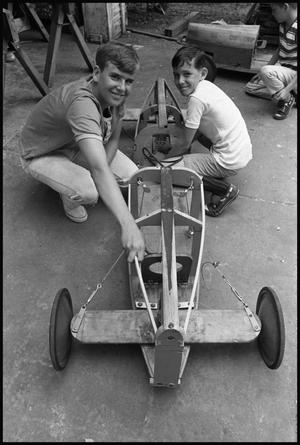 [Boys With Partially Built Soap Box Derby Car]