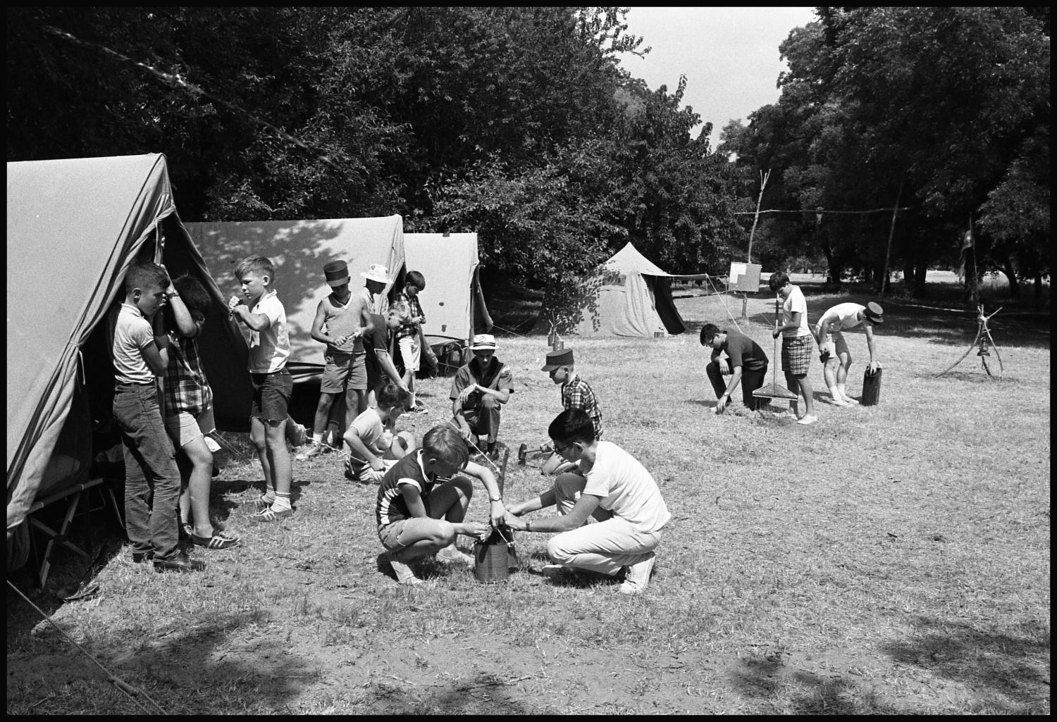 [Young Boys Setting Up a Camp Site] - The Portal to Texas History