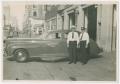 Photograph: [Fire Chief Funk, Assistant Chief Long with Chief's car]