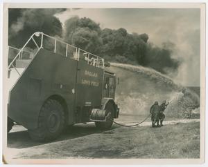 [Two Firefighters Hosing Down a Fire]