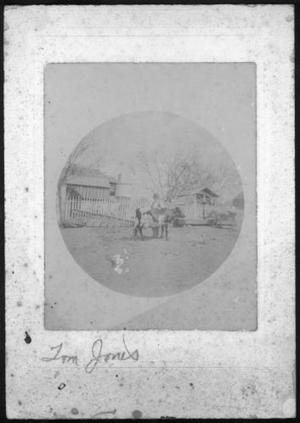 Primary view of object titled '[Tom Jones standing in a cow pasture]'.