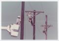 Thumbnail image of item number 1 in: '[Linemen working on electrical poles]'.