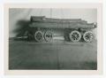 Photograph: [Photograph of Logs on Hand-Pulled Cart Frame]