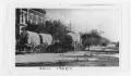 Thumbnail image of item number 1 in: '[Photograph of Covered Wagons on Street]'.