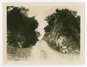 Primary view of object titled '[Dirt Road With Rocks On Both Sides]'.