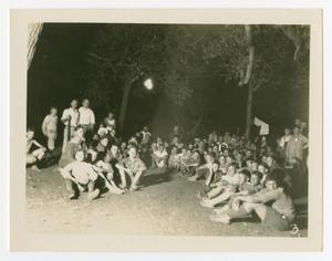 [Group Of Boys Seated Outdoors]