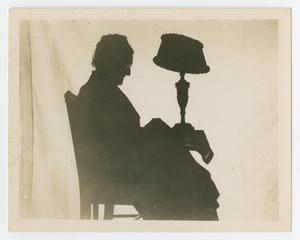 Primary view of object titled '[Silhouette Of A Woman Sitting In A Chair]'.