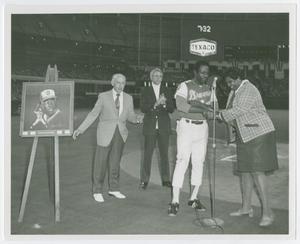 Primary view of object titled '[Barbara Jordan Shakes Hands with Hank Aaron]'.